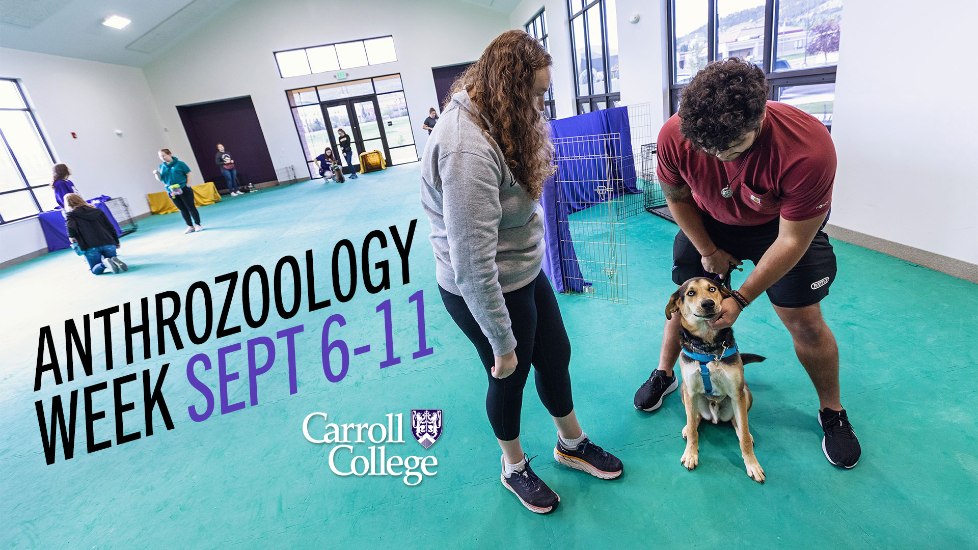 Guy and Girl Training Dog in the ANZ Center