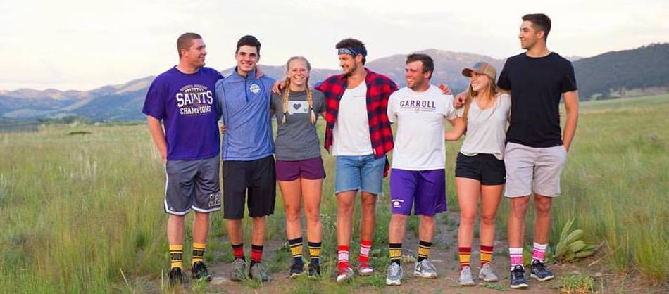 A group of Carroll Students in a green field