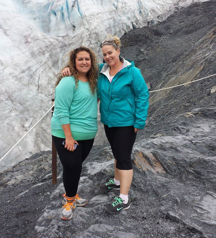 Katie Browne on a rocky slope with a friend