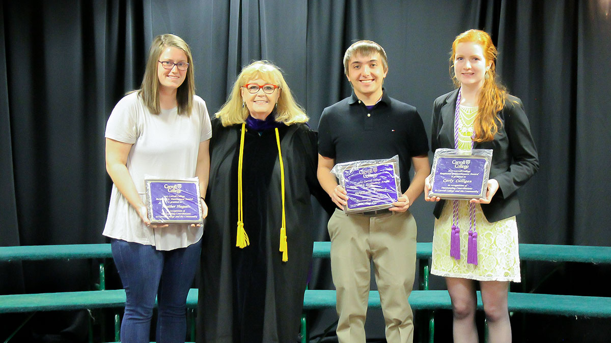 Image of students receiving the Hunthausen Outstanding Citizenship Award