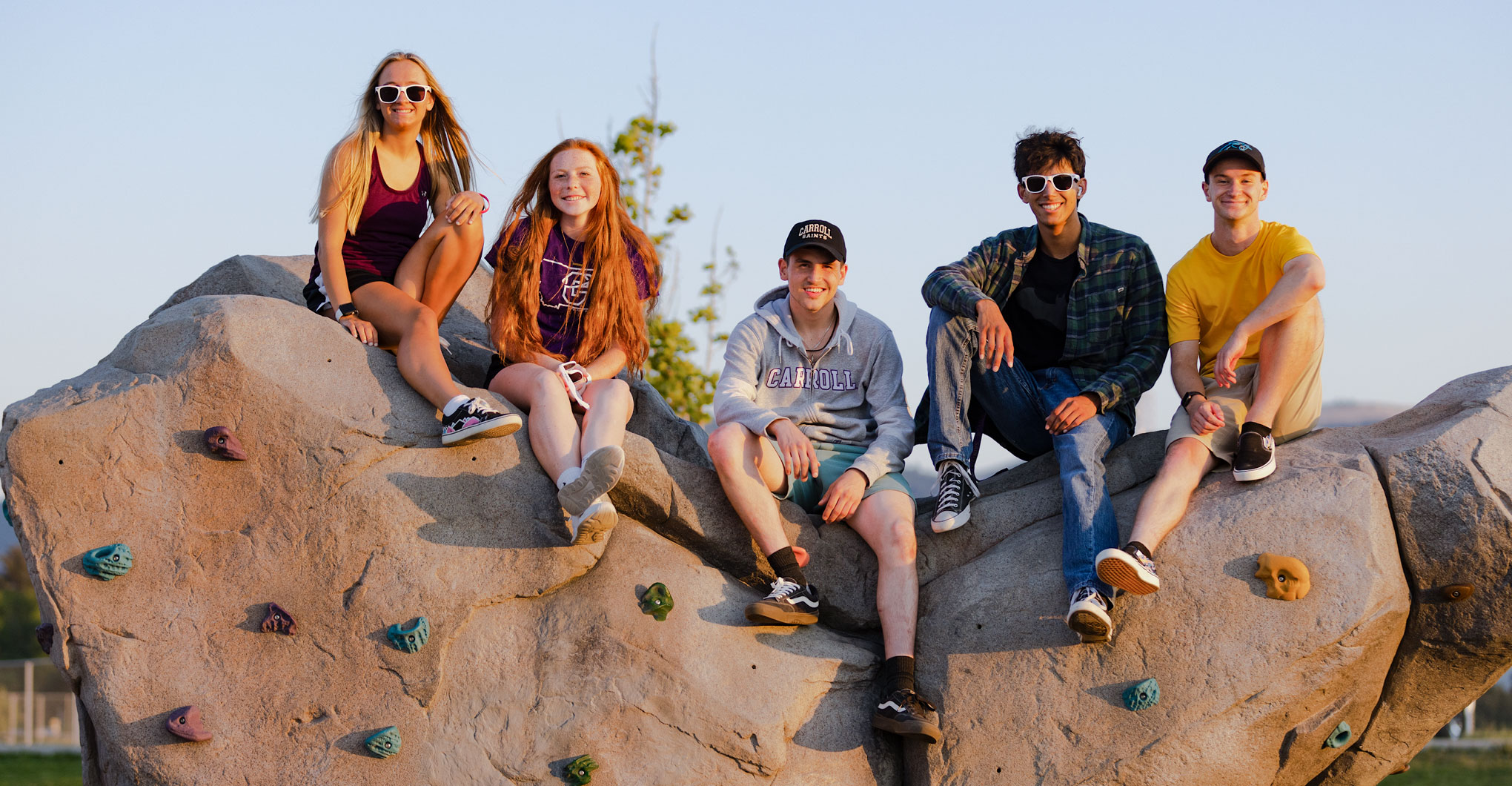 Five Students on Climbing Rock