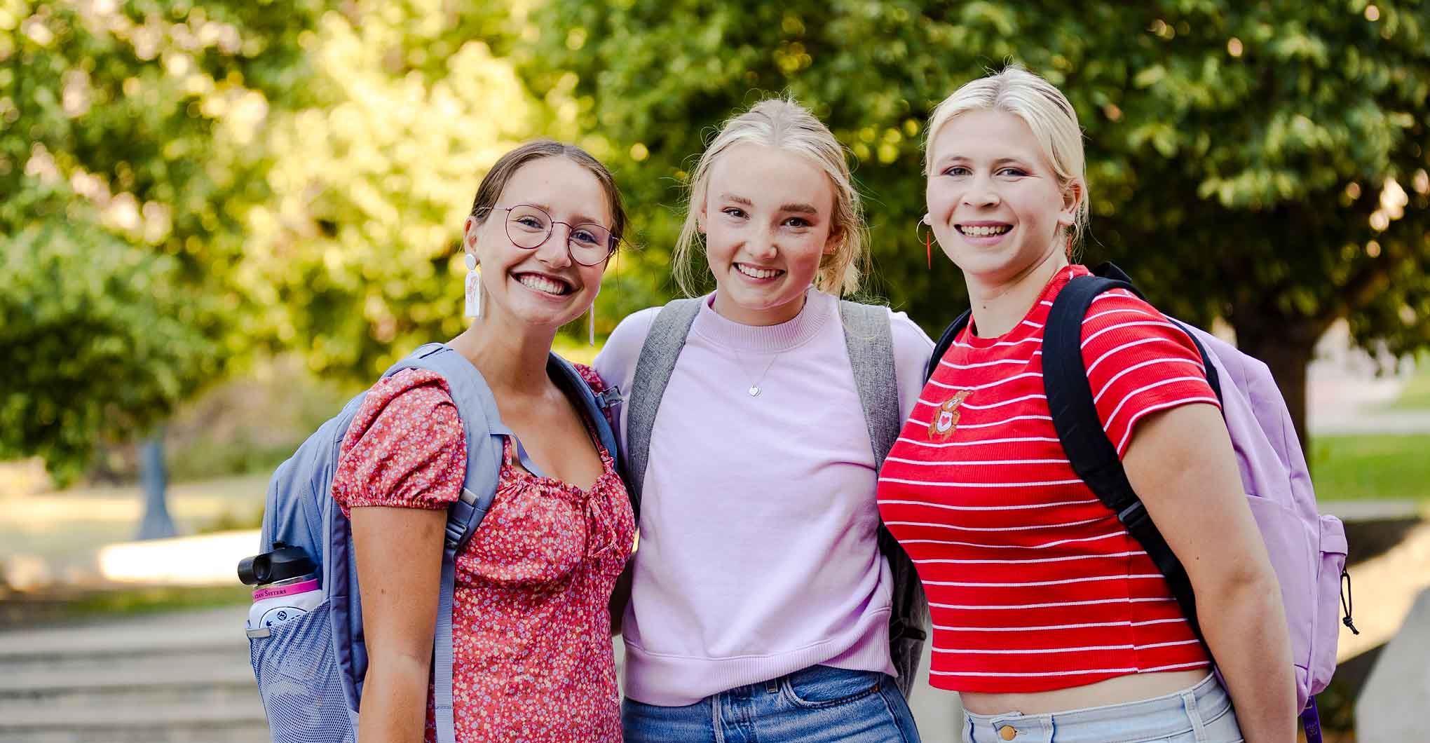 Three Female Students Smiling