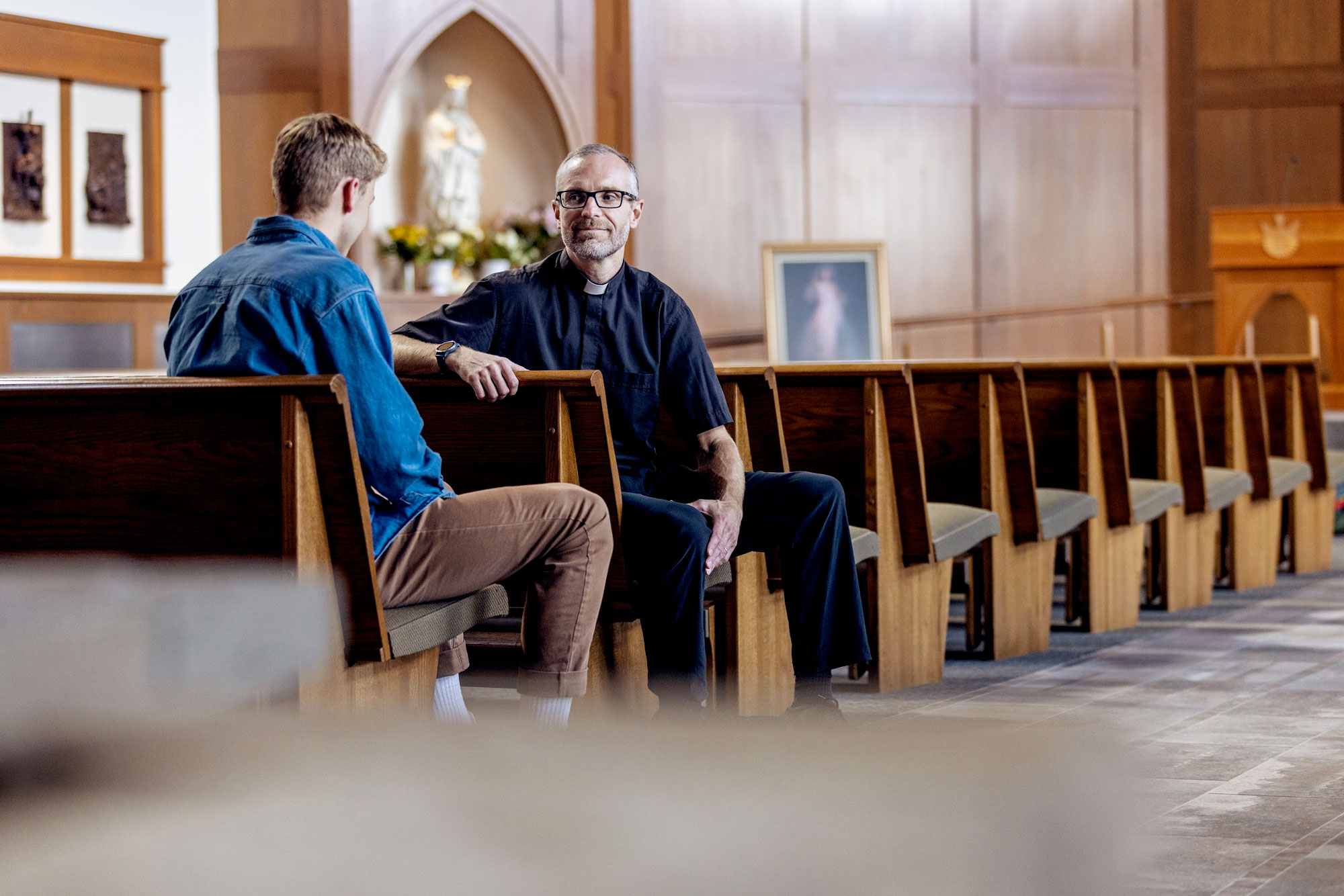 Fr. Marc with student