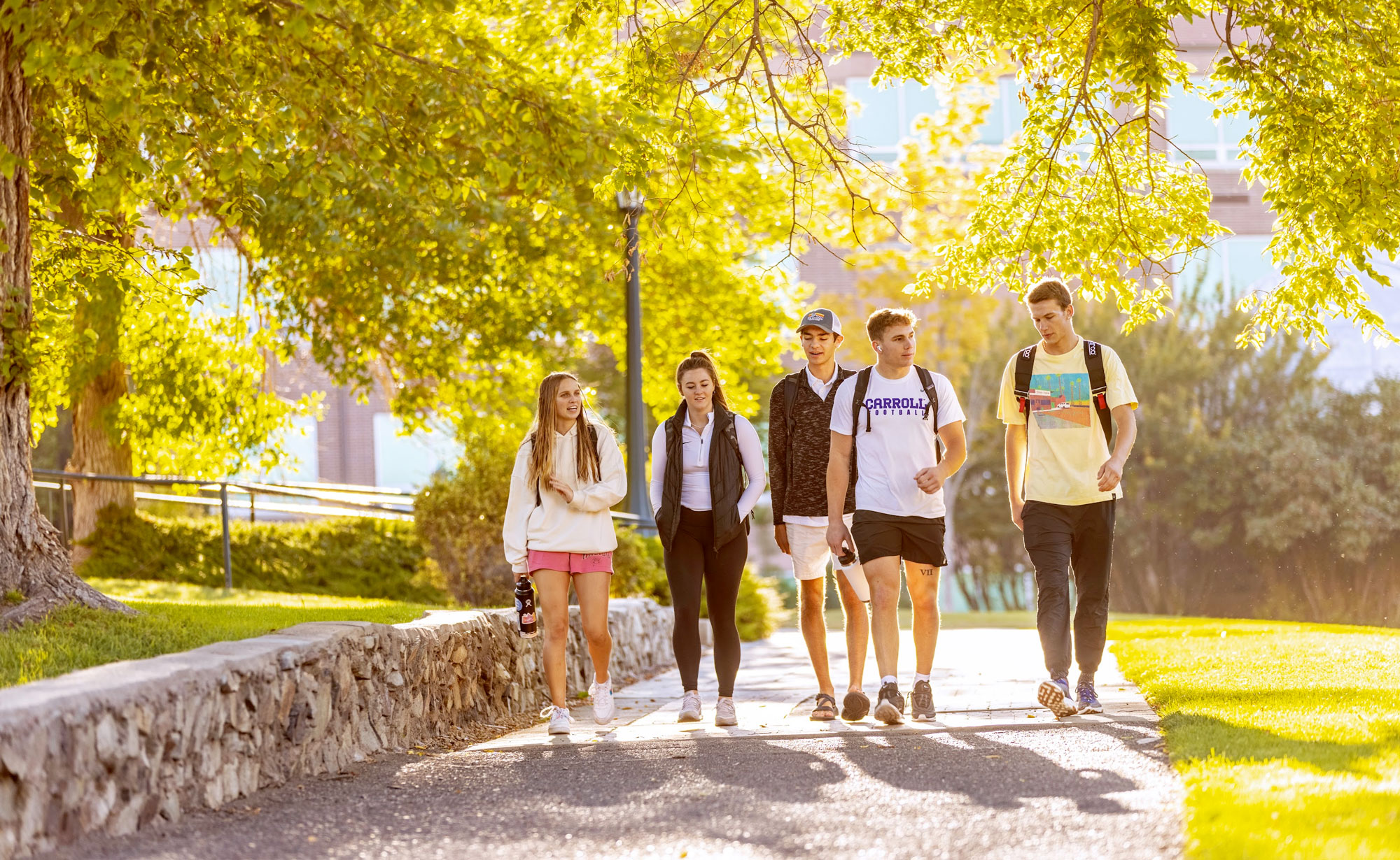 Students Walk on the Path in Fall