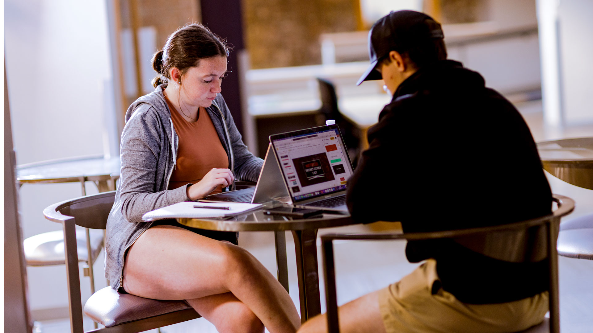 Students study on laptops