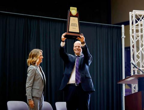 President Cech with NAIA Trophy