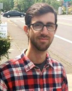 Portrait of Andrew Chenovick on a street